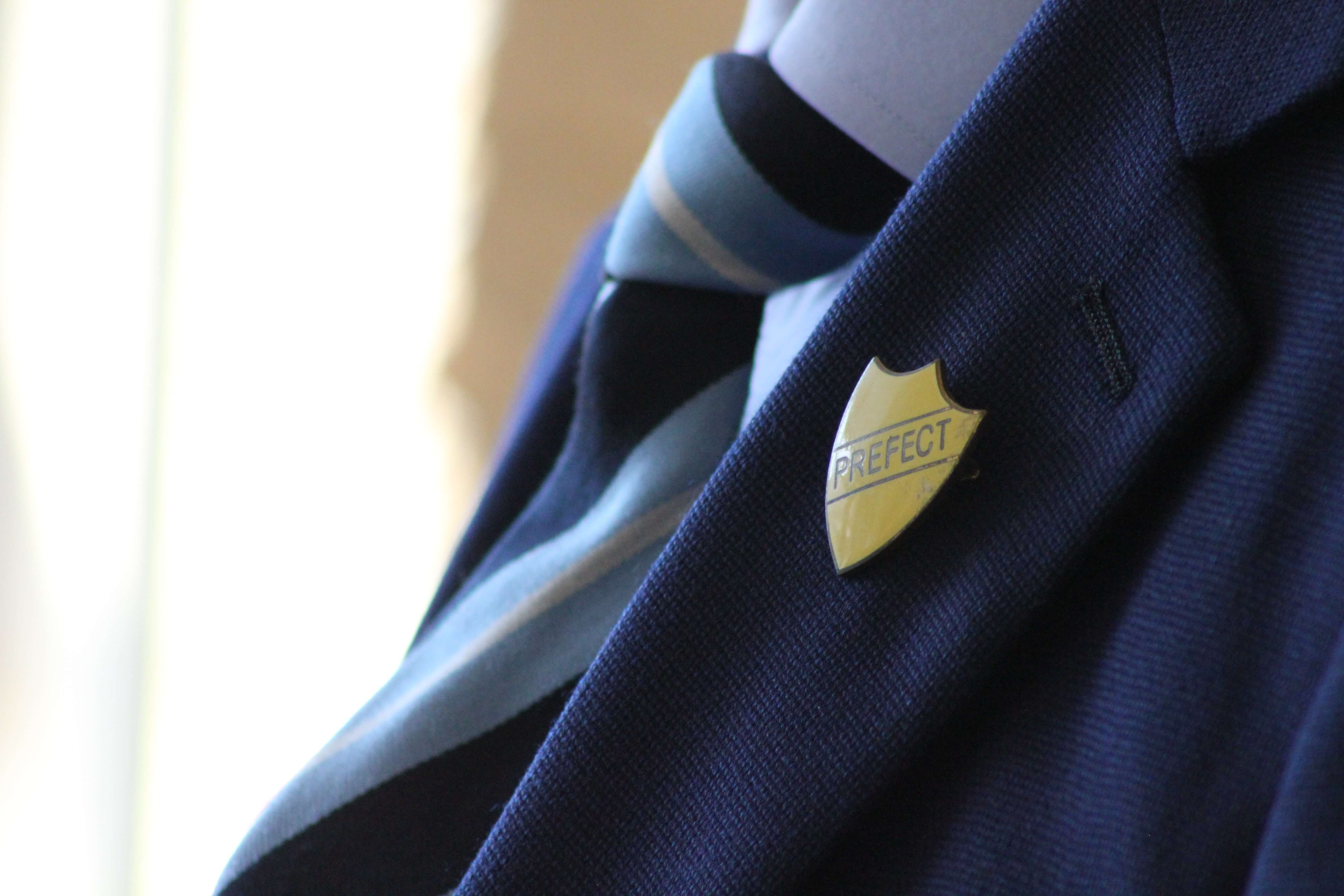 Photo of school uniform by Robin Worrall for Unsplash